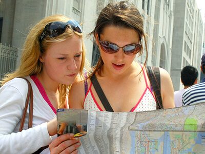 Hen Parties Kilkenny Hen Party Kilkenny Two young ladies studying clues while trying to complete the Kilkenny Activity Centre Treasure Trail.